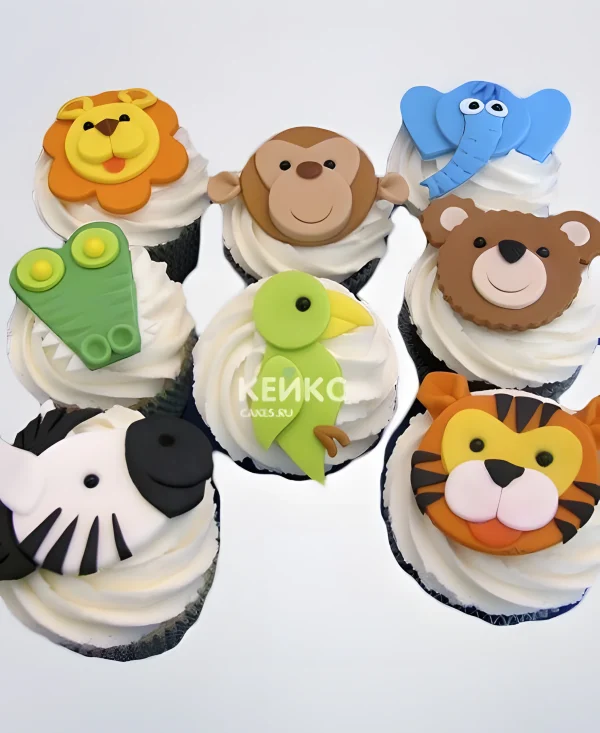 Яркие капкейки с мордочками зверей на годик Фото