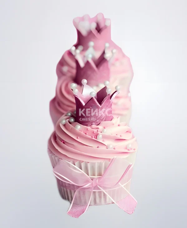 Розовые капкейки с коронами и бантиками на годик Фото