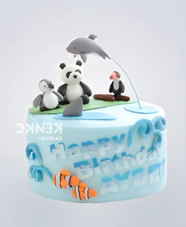 Синий торт с фигурками дельфина и зверушек Фото