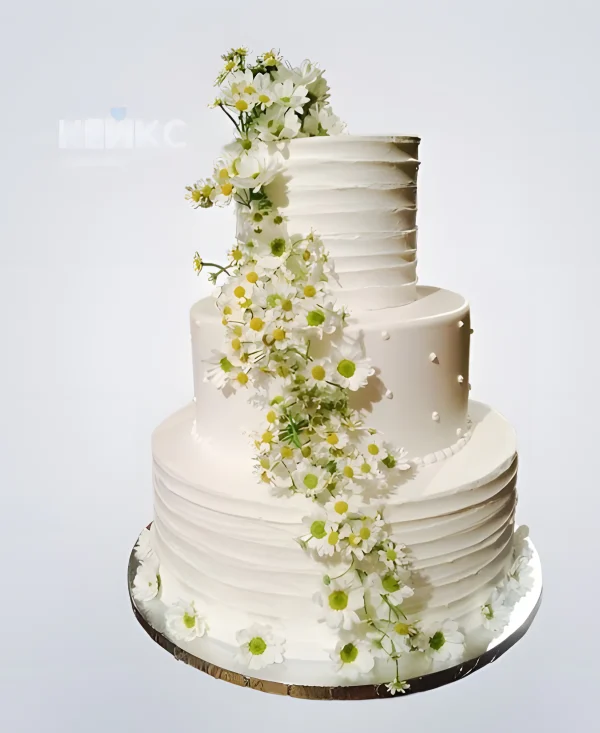 Трехъярусный свадебный торт с ромашками и бусинами Фото