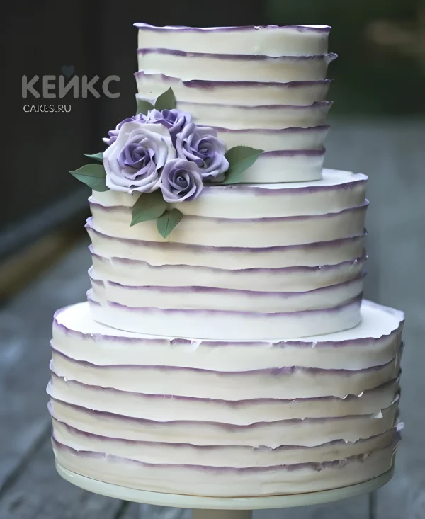 Трехъярусный свадебный торт с синими розами Фото