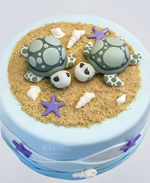 Торт с фигурками черепашек на пляже Фото