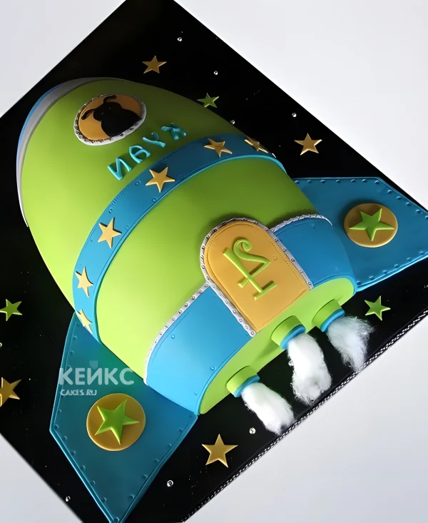 Торт в виде зелено-синей ракеты Фото