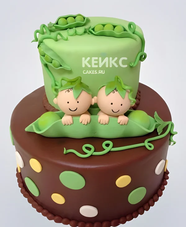 Торт с фигурками младенцев и зеленым горошком Фото