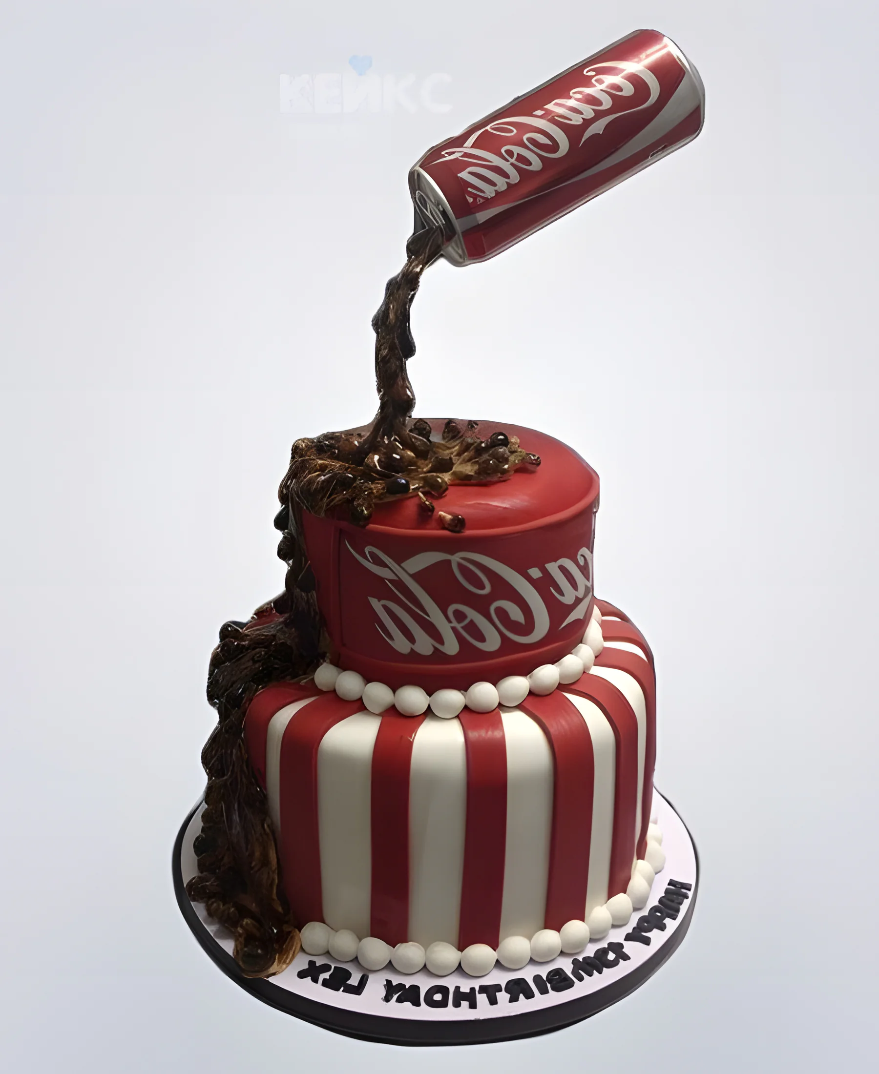 Двухъярусный гравитационный торт с логотипом компании Coca-Cola Фото