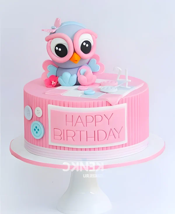 Розовый торт с фиолетовой совой Фото