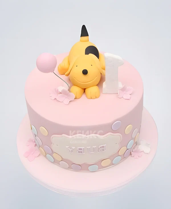 Торт бело-розовый с желтой собачкой Фото