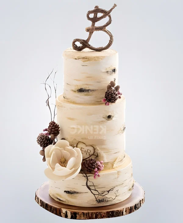 Торт свадебный с инициалами, веточками и шишками Фото