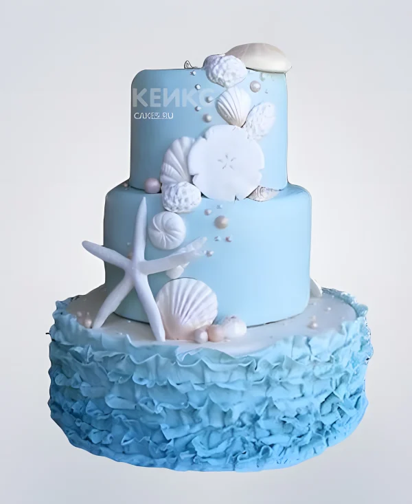 Нежный свадебный торт в в морском стиле с ракушками Фото
