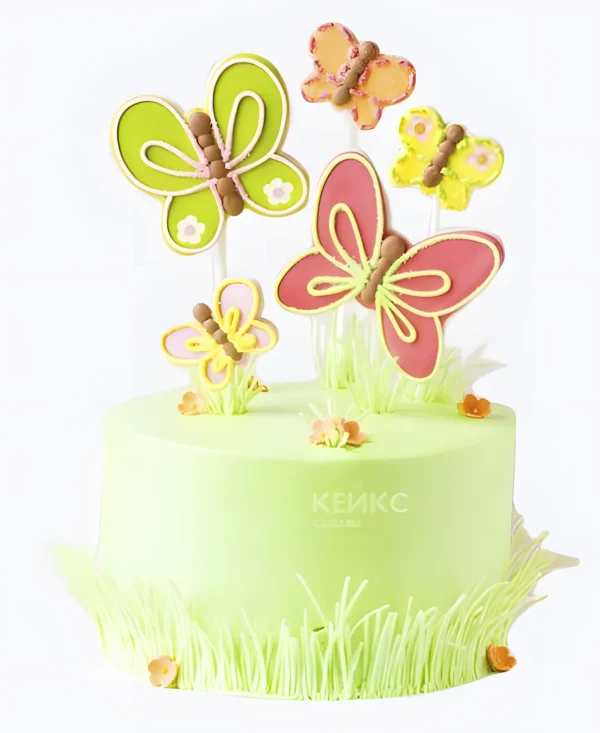 Нежно-зеленый торт с бабочками Фото