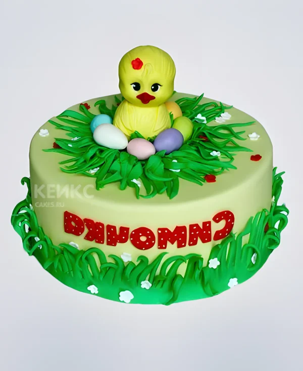 Торт с фигуркой цыпленка в травке Фото