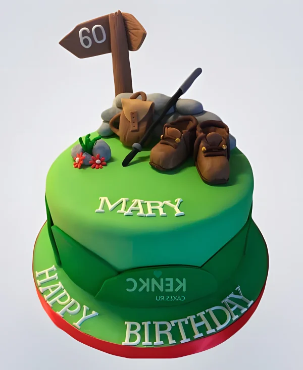 Торт зеленый с рюкзаком и башмаками Фото