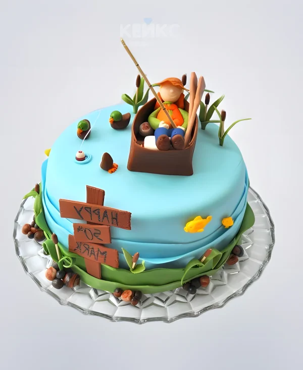 Торт с рыбаком в лодке Фото