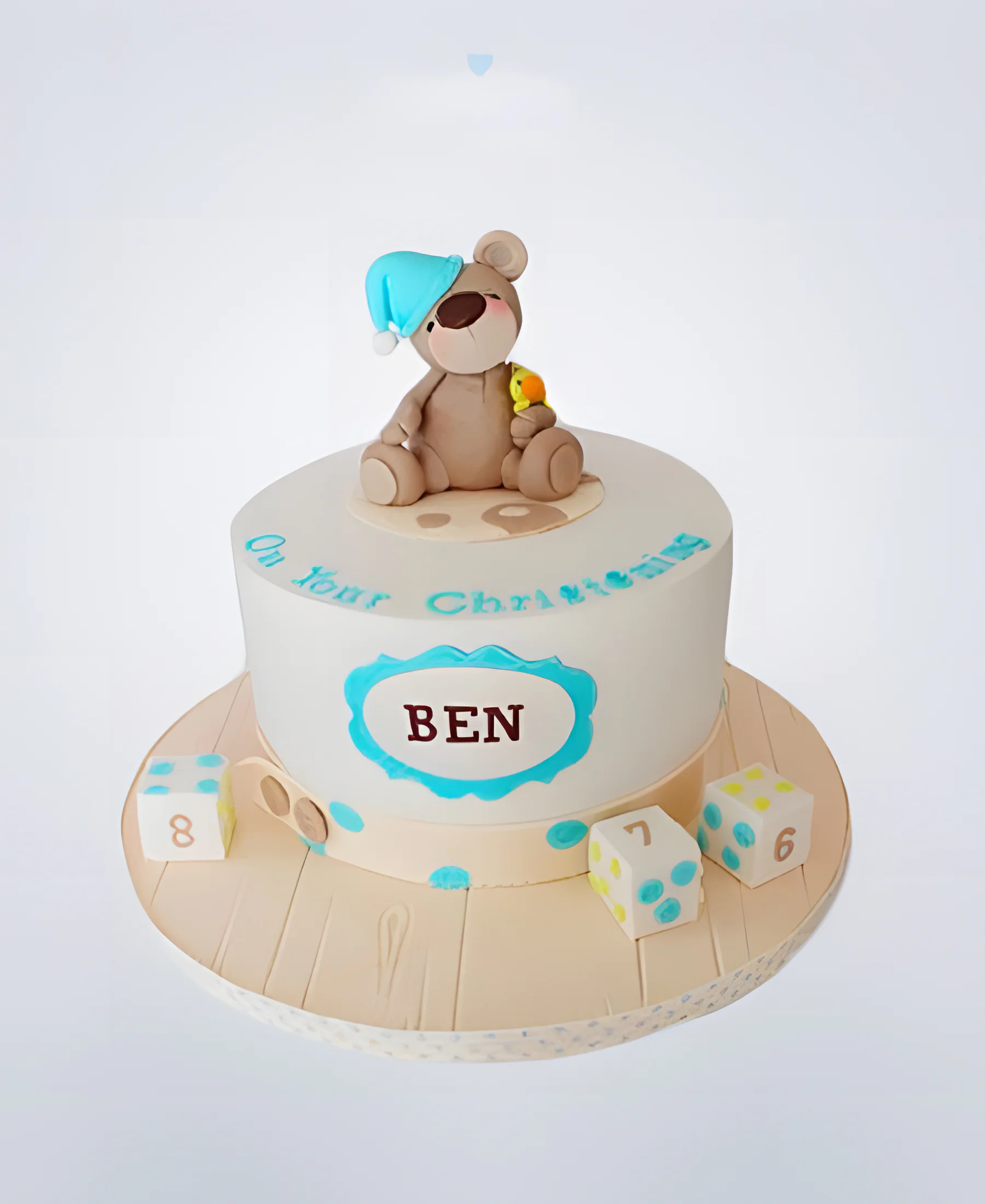 Торт с фигуркой мишки и кубиками Фото