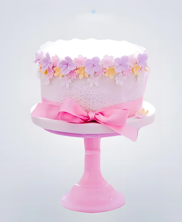 Торт с цветами и розовым бантиком Фото