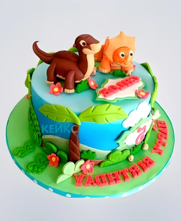 Разноцветный торт с фигурками динозавров Фото