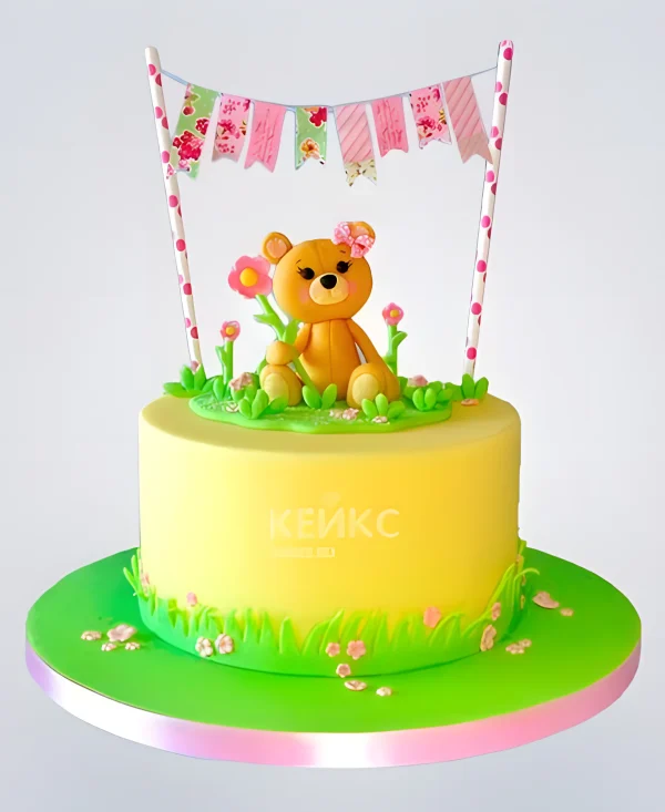 Желто-зеленый торт с мишкой Фото
