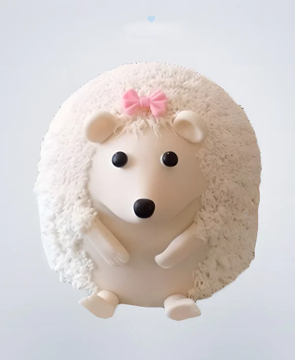 Торт 3D в виде ежика с розовым бантиком Фото