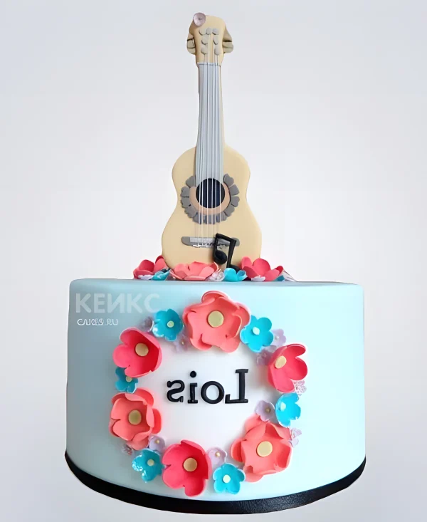 Милый торт с гитарой и цветами Фото