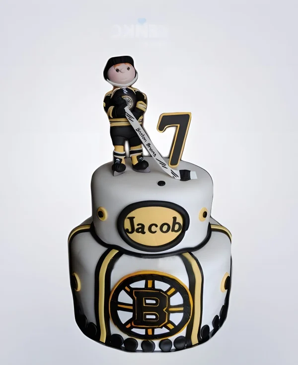 Торт хоккей с фигуркой игрока и надписью Фото