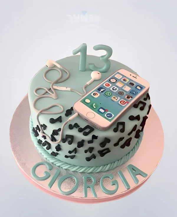 Торт с розовым айфоном и наушниками Фото
