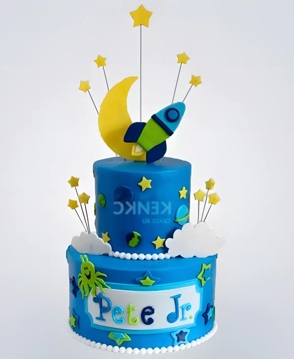 Синий торт космический корабль с полумесяцем Фото