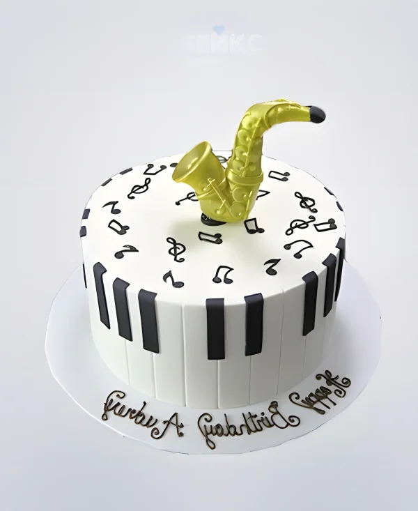 Торт музыканту с фигуркой саксофона Фото