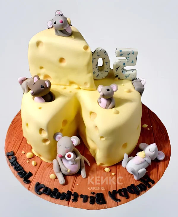 Оригинальный торт в виде сыра с мышками Фото