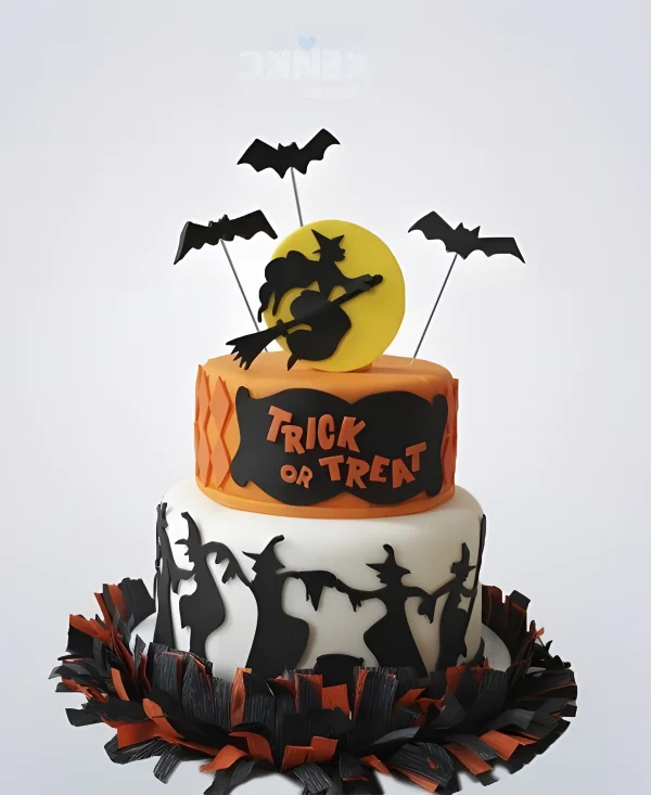 Торт на Хэллоуин с ведьмой на метле Фото