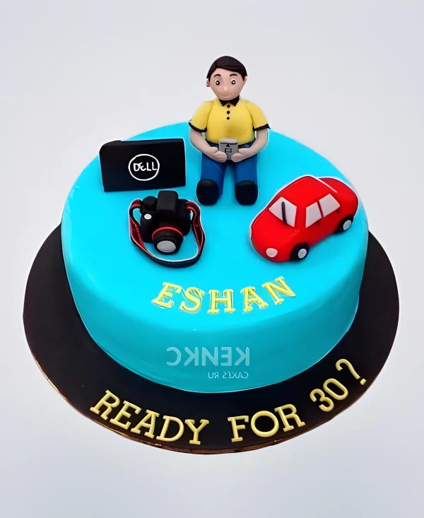 Торт голубой с фотоаппаратом и красной машиной Фото
