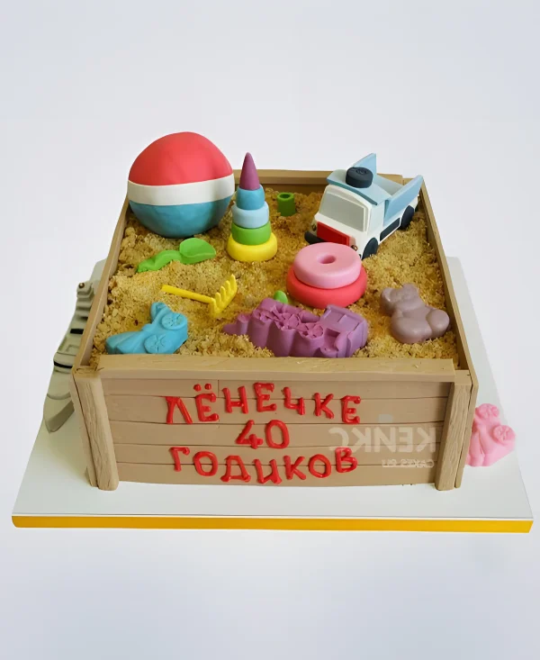 Торт с детскими игрушками и надписями Фото