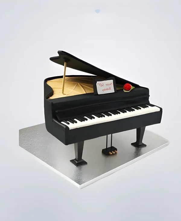 Торт в виде черного пианино Фото