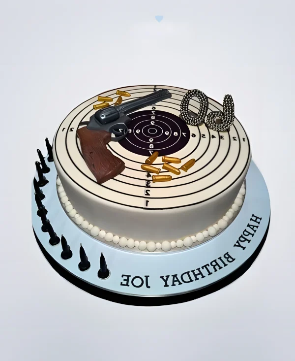 Торт пистолет с мишенью и патронами Фото