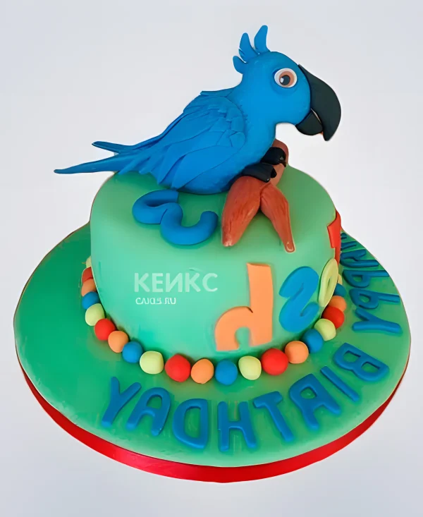 Яркий зеленый торт с голубым попугаем Фото