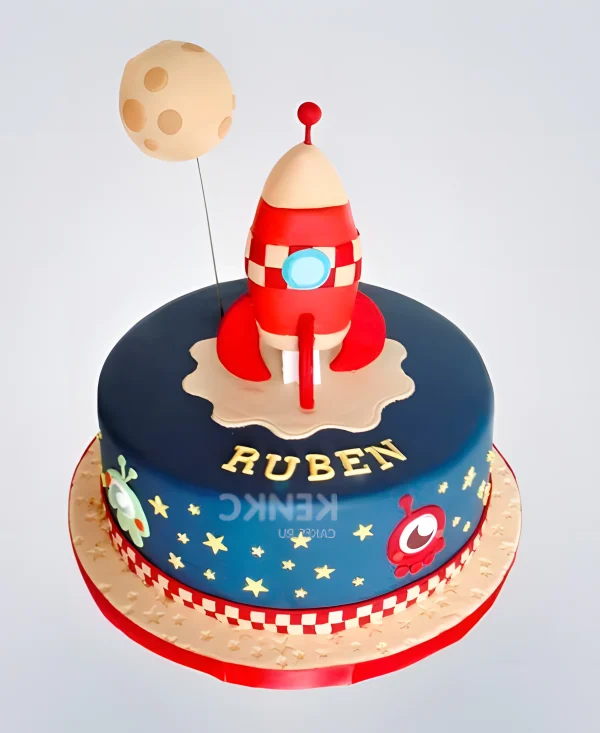 Торт со звездами и фигуркой ракеты Фото