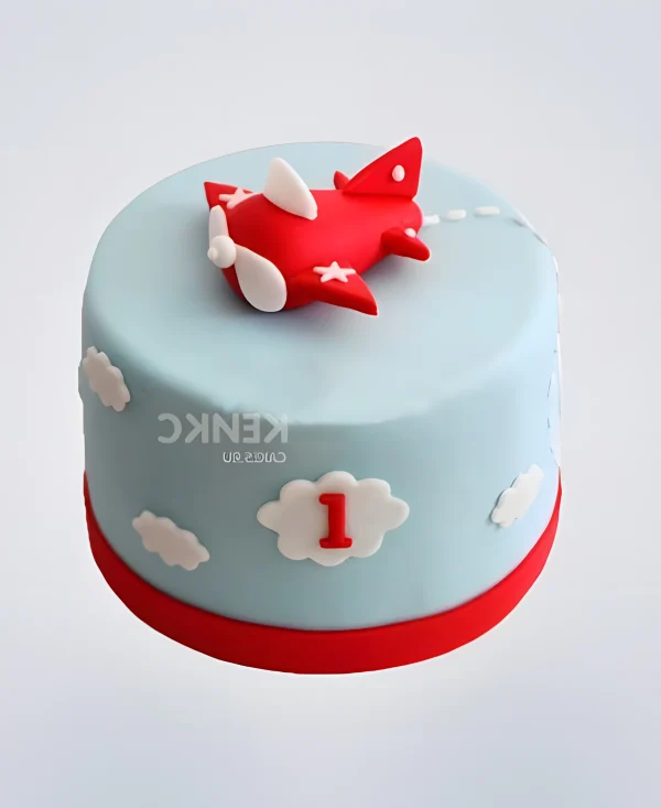 Нежно-голубой торт с красным самолетом в облаках Фото