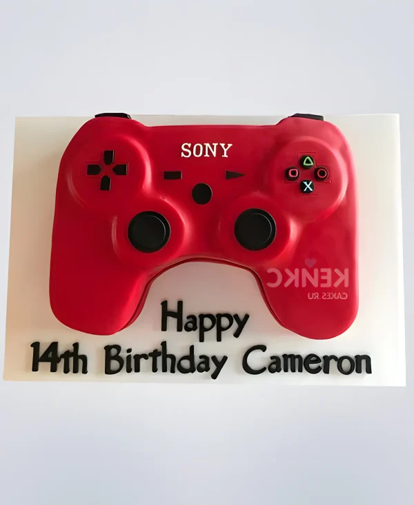 Торт в виде красного джойстика с надписью Фото