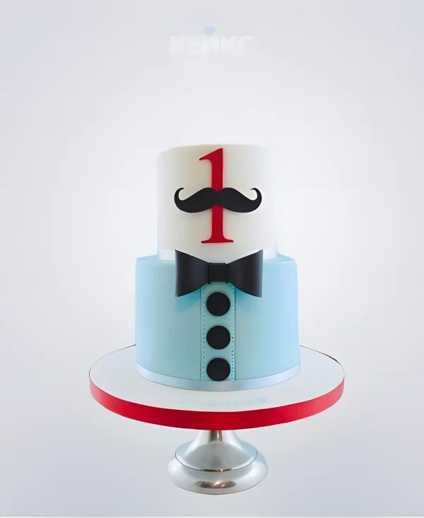 Бело-голубой торт с галстуком бабочкой и цифрой 1 Фото