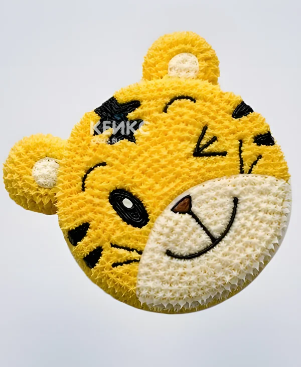 Торт в виде подмигивающей мордочки тигра Фото