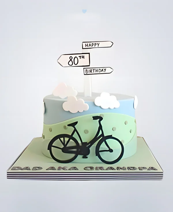 Торт с велосипедом и дорожными указателями Фото