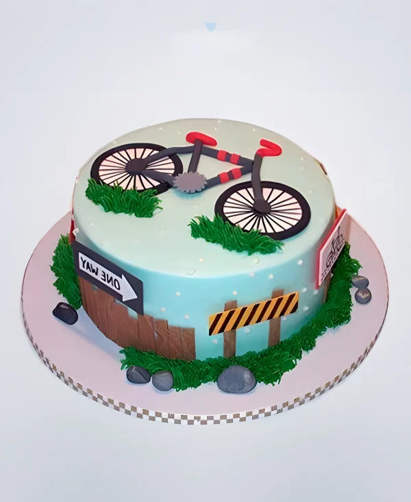 Торт с велосипедом и дорожными знаками Фото