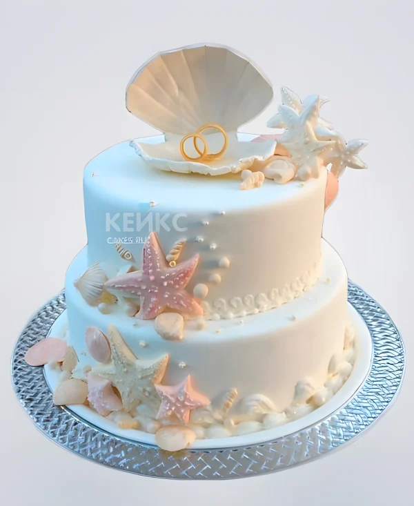 Красивый торт с жемчужиной и морскими звездами Фото