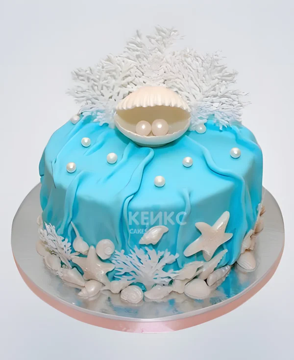 Голубой торт с жемчужиной Фото