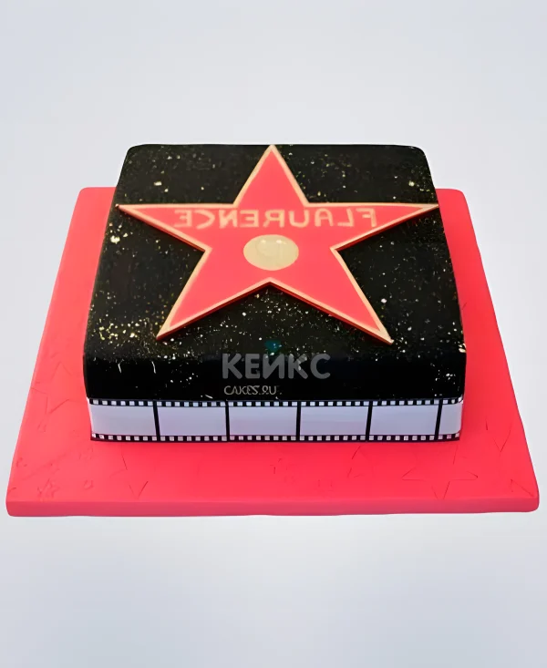 Красно-черный торт со звездой и кинолентой Фото