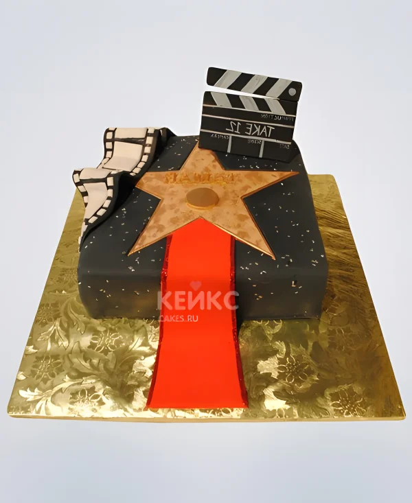 Торт со звездой и кинолентой Фото