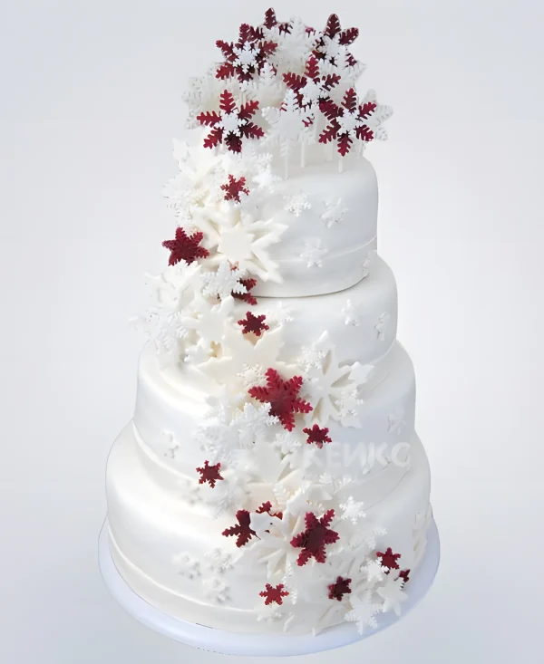 Белый зимний свадебный торт со снежинками Фото