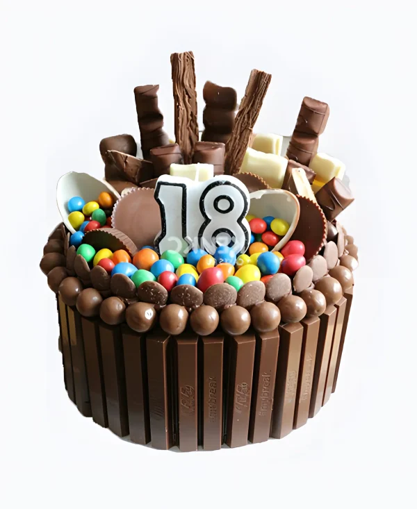 Торт с цифрами и шоколадными сладостями Фото