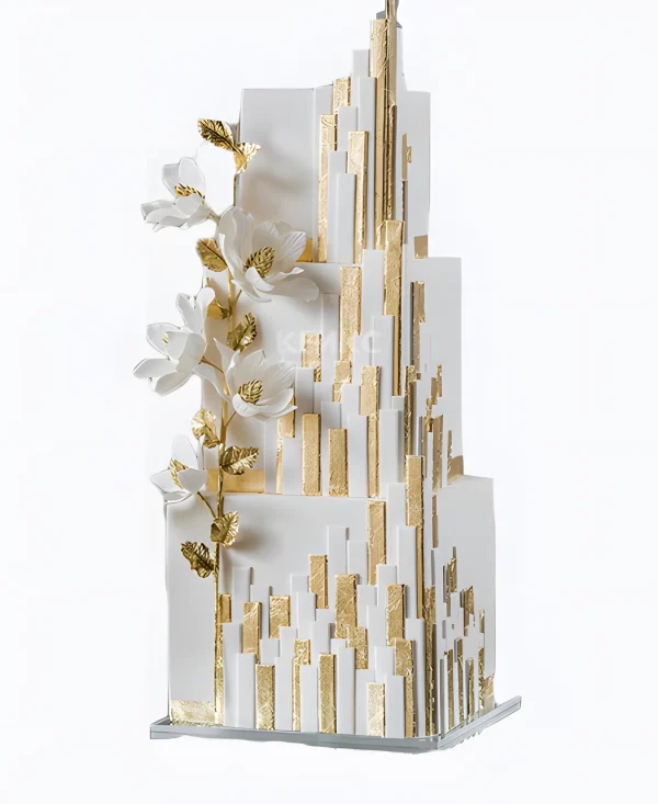 Свадебный торт с золотой геометрией и сахарным цветком Фото