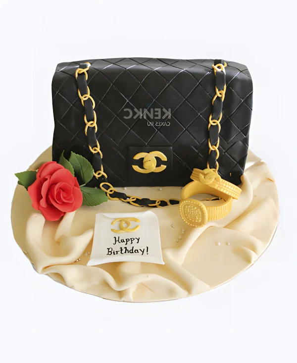 Торт в виде черной сумки шанель с розой Фото