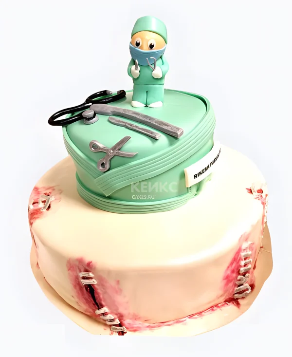 Двухъярусный торт для хирурга с медицинскими инструментами Фото